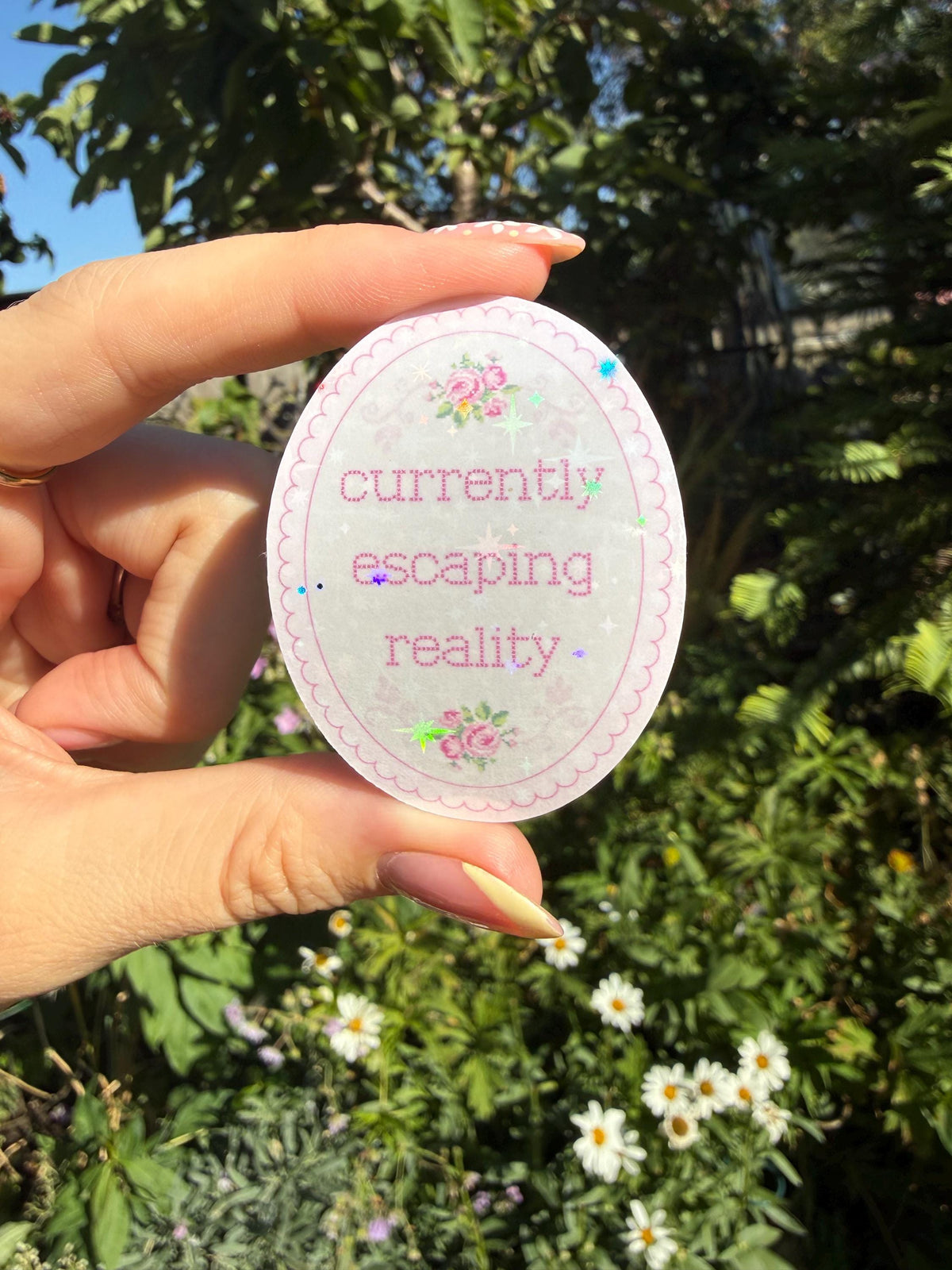 Currently Escaping Reality Cross Stitch Holographic Bookish Sticker